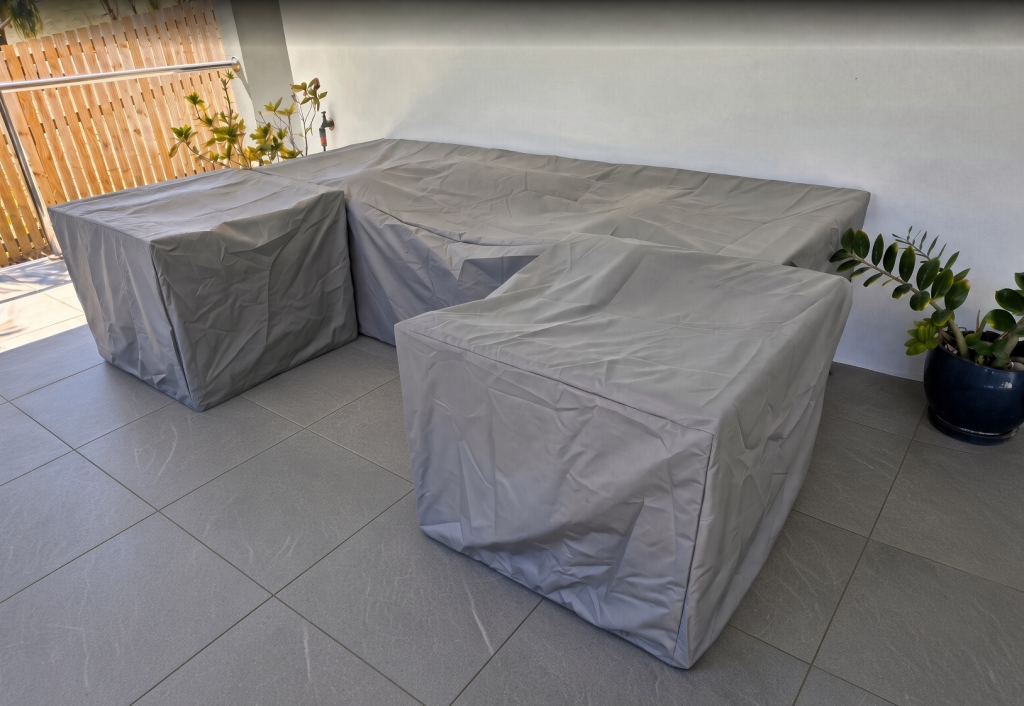 custom-patio-sofa-cover-canada.jpg Custom made patio sofa cover in grey with matching chair covers on a tiled patio – The Cover Company Canada